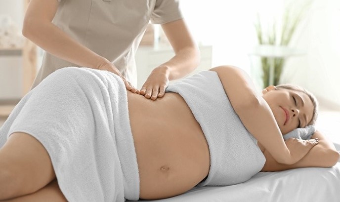 massage giảm đau lưng khi mang thai